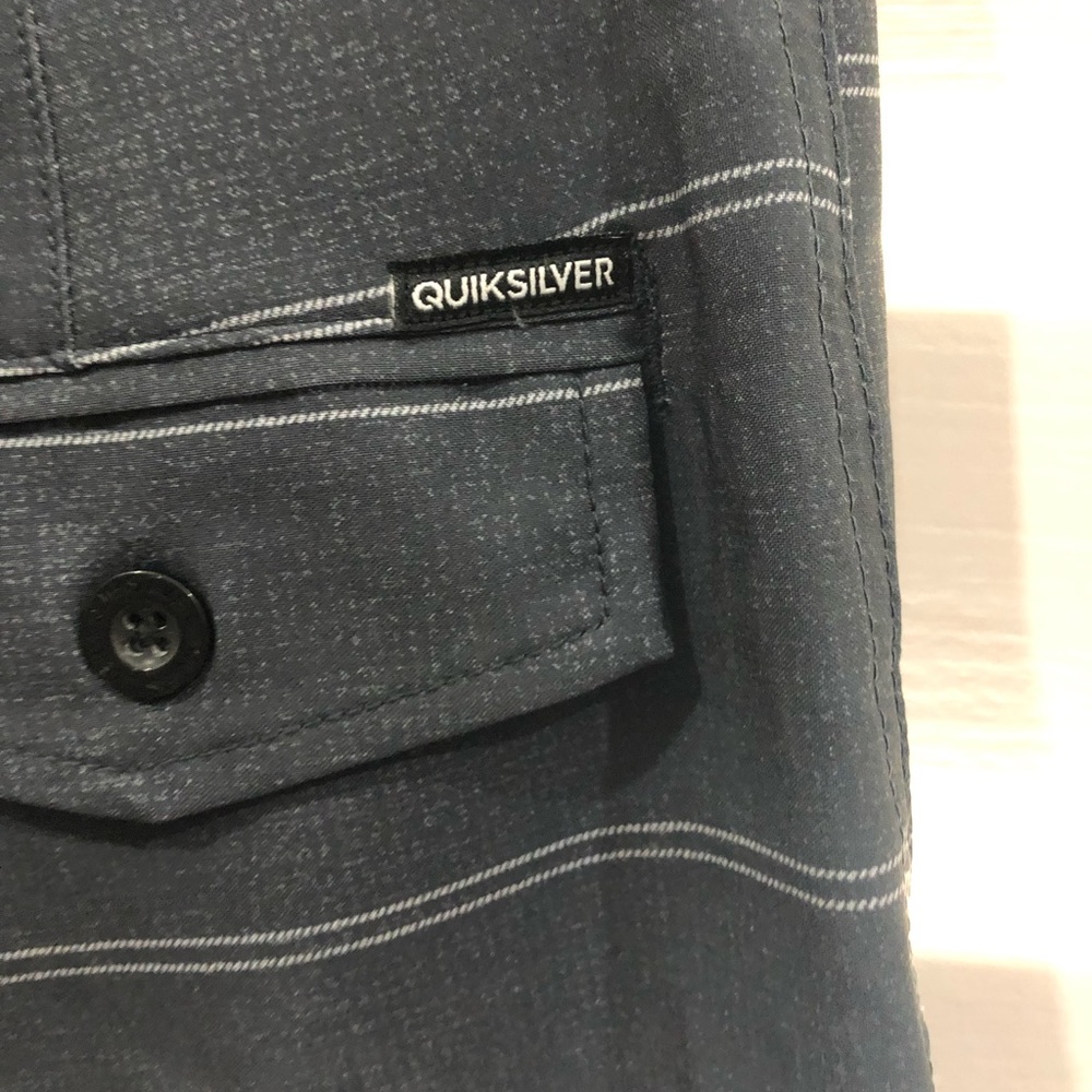 Quicksilver junior size 14 swim trunks.